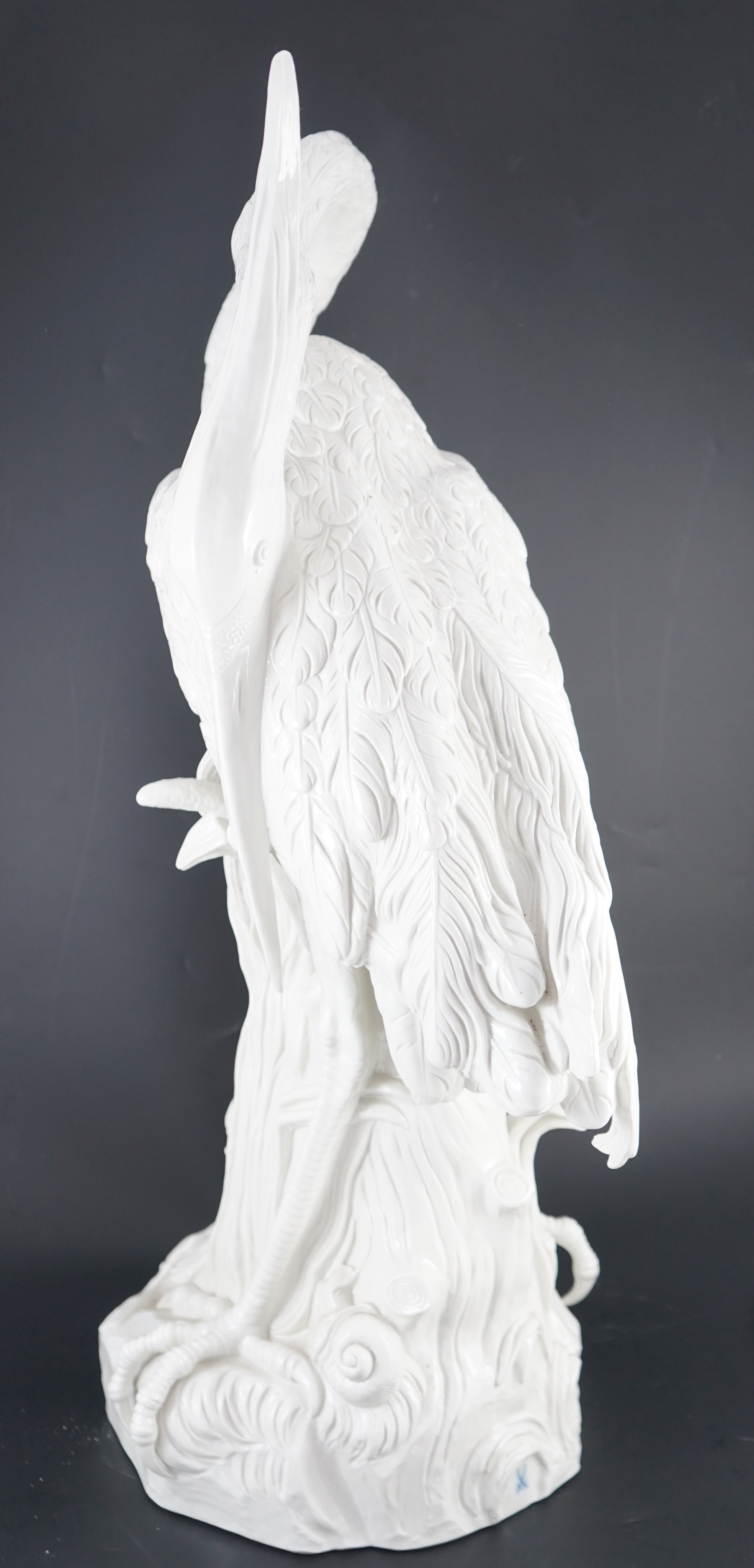 An impressive Meissen white glazed porcelain life size model of a heron, 20th century, after J. J. Kändler, 76.5cm high